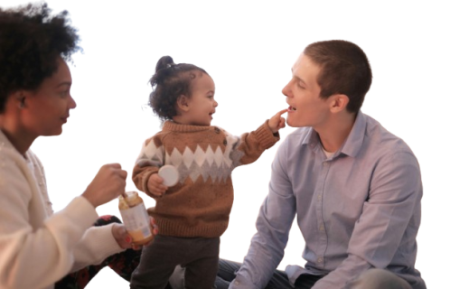 baby_in_parents-removebg-preview